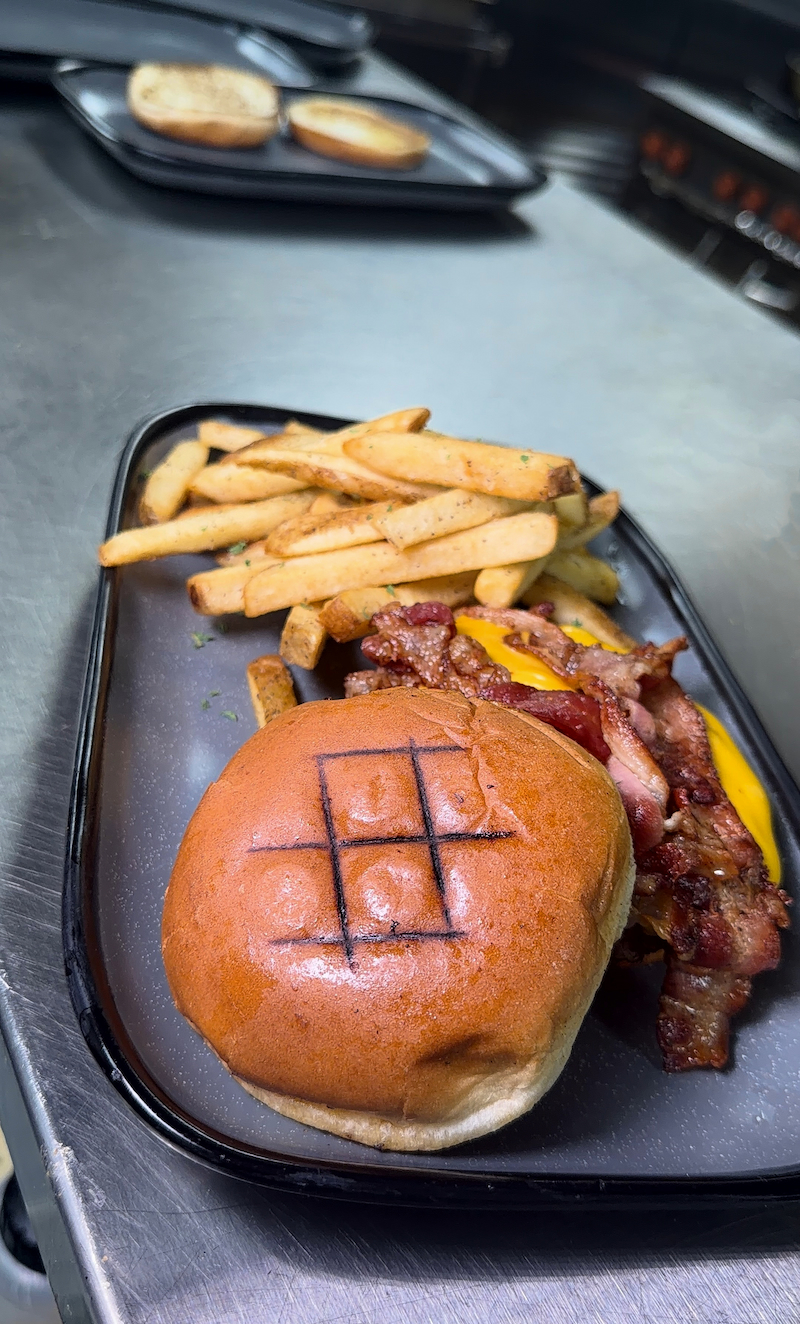 Bacon cheeseburger with seasoned fries